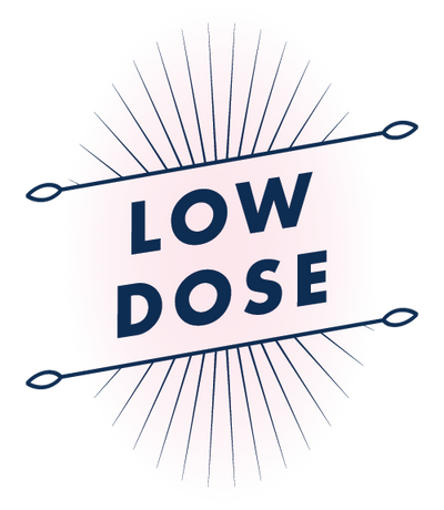 Text 'LOW DOSE' with decorative elements on a white background