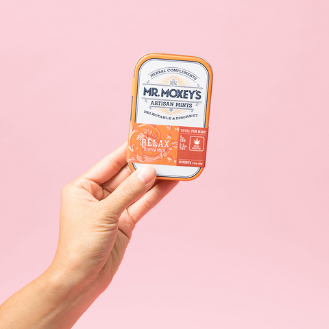 Relax Cinnamon Mints in orange tin with 2:1 CBD & THC